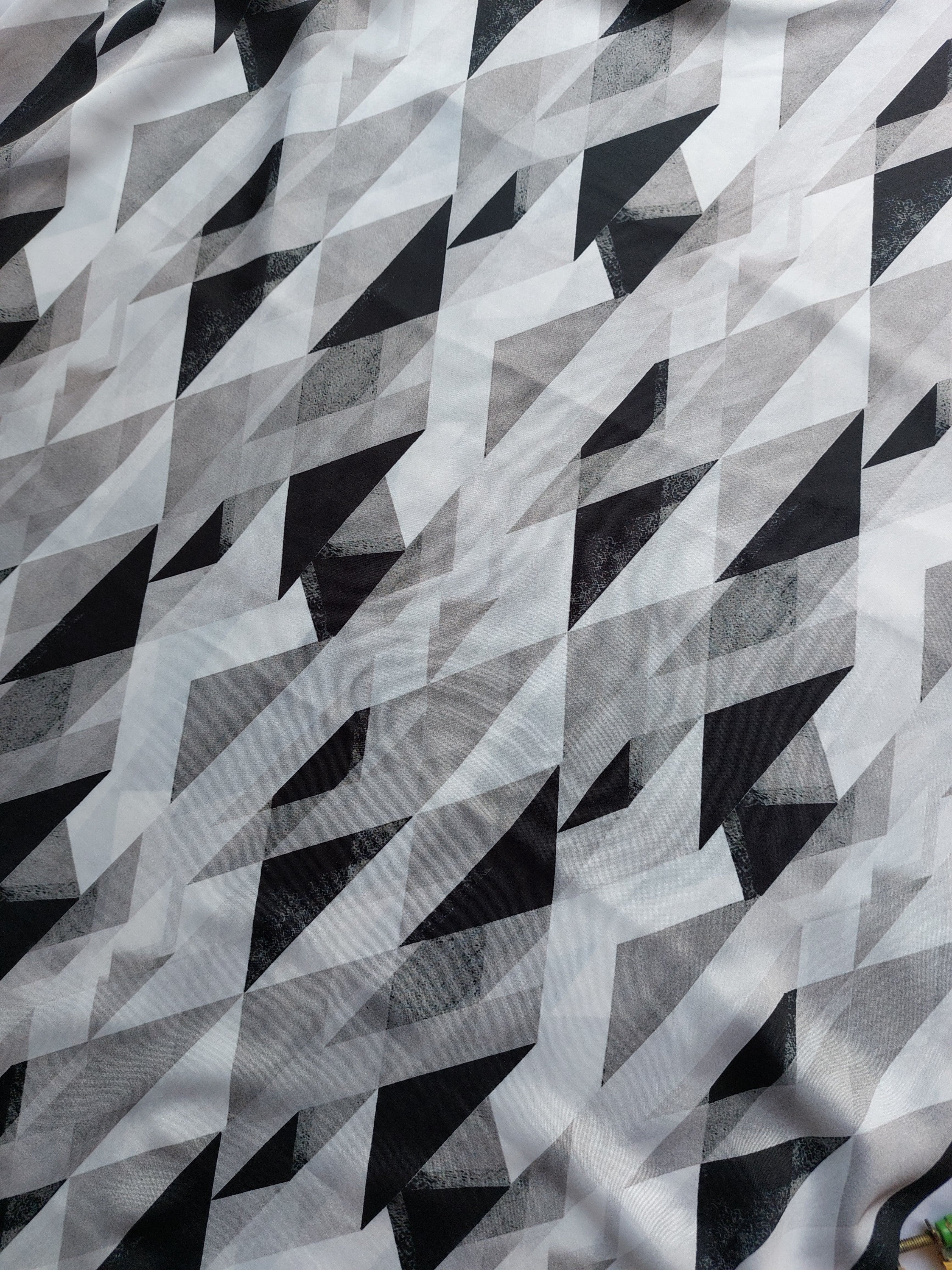 White & Black Geometrical Digital Printed Modal Satin Fabric. Fabric 